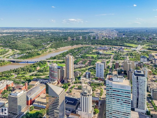 Urban skyline with a river and extensive green spaces - #1501 10180 103 St Nw, Edmonton, AB - Outdoor With View