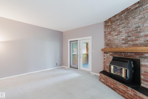 3936 72 Street Nw, Edmonton, AB - Indoor With Fireplace