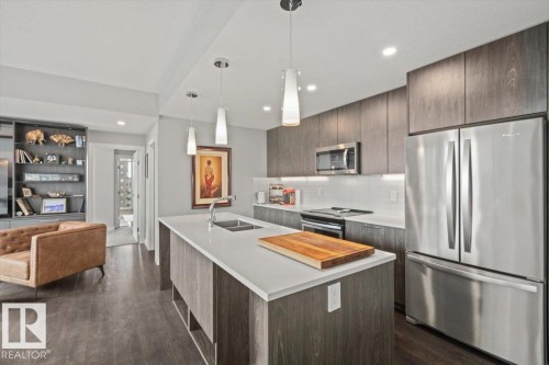 1200 10180 103 Street, Edmonton, AB - Indoor Photo Showing Kitchen With Stainless Steel Kitchen With Double Sink With Upgraded Kitchen