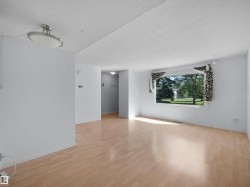 Bright interior space featuring light wood-finish flooring - 