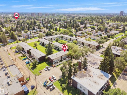 Aerial perspective showcasing a residential area with multi-unit buildings - 10446 55 Avenue Nw, Edmonton, AB - Outdoor With View