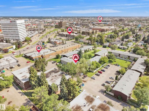 Aerial view showcasing a multi-unit property within an urban environment - 10446 55 Avenue Nw, Edmonton, AB - Outdoor With View