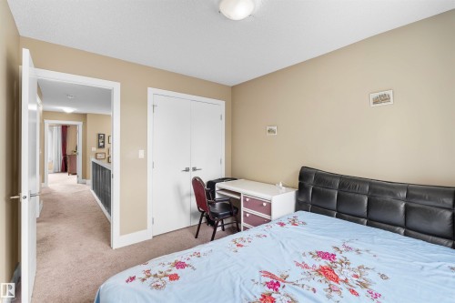 Carpeted room with neutral-toned walls - 11719 127 Street Nw, Edmonton, AB - Indoor Photo Showing Bedroom