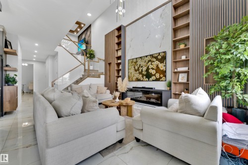 139 28 Street, Edmonton, AB - Indoor Photo Showing Living Room With Fireplace