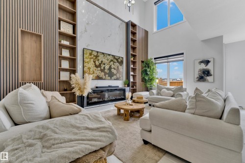 139 28 Street, Edmonton, AB - Indoor Photo Showing Living Room With Fireplace