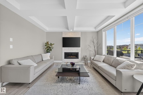 7640 179 Avenue Nw, Edmonton, AB - Indoor Photo Showing Living Room With Fireplace