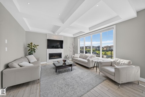 7640 179 Avenue Nw, Edmonton, AB - Indoor Photo Showing Living Room With Fireplace