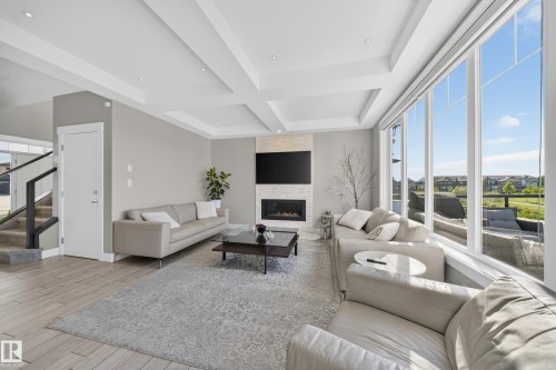 7640 179 Avenue Nw, Edmonton, AB - Indoor Photo Showing Living Room With Fireplace