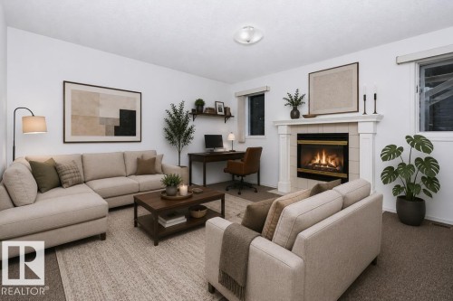 10057 91 Avenue Nw, Edmonton, AB - Indoor Photo Showing Living Room With Fireplace