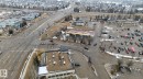 Image quality insufficient for description - 423 2430 Guardian Road, Edmonton, AB  - Outdoor With View 
