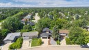 Aerial perspective showcasing a residential street lined with mature trees - 3412 108 Street Nw, Edmonton, AB  - Outdoor With View 