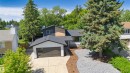 Contemporary exterior featuring a multi-tone facade with dark siding and wood-finish accents - 3412 108 Street Nw, Edmonton, AB  - Outdoor 