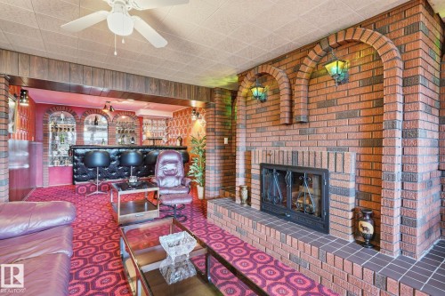 14511 83 Street Nw, Edmonton, AB - Indoor Photo Showing Living Room With Fireplace