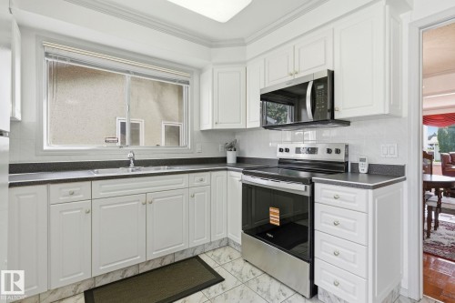 14511 83 Street Nw, Edmonton, AB - Indoor Photo Showing Kitchen With Double Sink