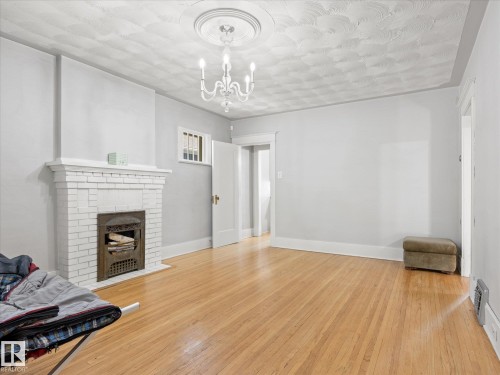 11331 66 Street Nw, Edmonton, AB - Indoor With Fireplace