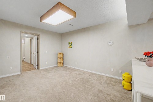711 Butterworth Drive Nw, Edmonton, AB - Indoor Photo Showing Other Room