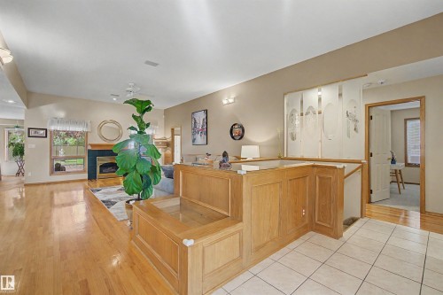 711 Butterworth Drive Nw, Edmonton, AB - Indoor Photo Showing Other Room With Fireplace