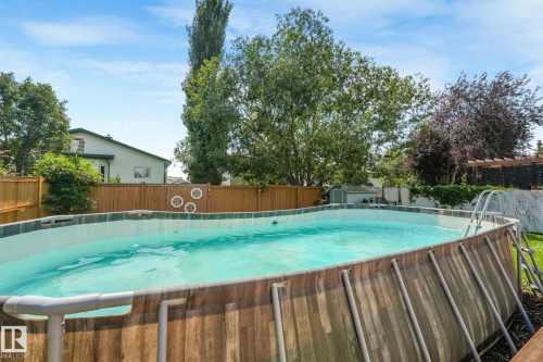 5809 48 Avenue, Beaumont, AB - Outdoor With Above Ground Pool With Backyard