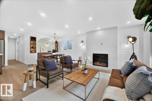 11604 35 Avenue Nw, Edmonton, AB - Indoor Photo Showing Living Room With Fireplace