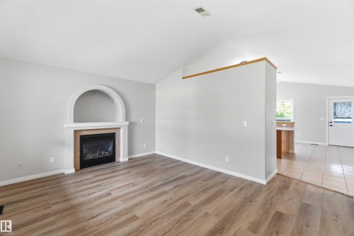 38 Willow Park Road, Stony Plain, AB - Indoor Photo Showing Living Room With Fireplace