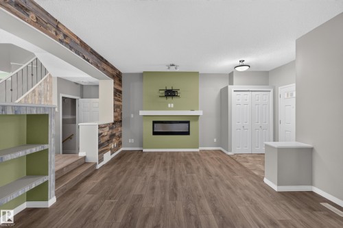 Living room - 3139 Carpenter Landing Sw, Edmonton, AB - Indoor With Fireplace