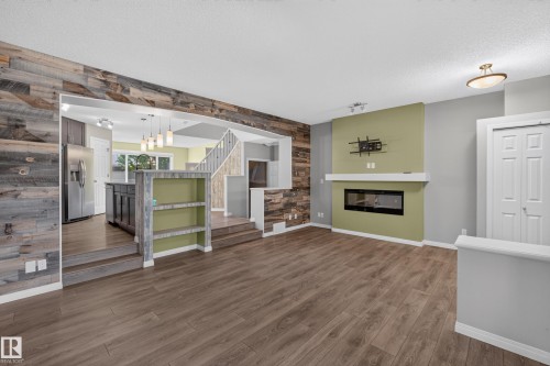 Living room - 3139 Carpenter Landing Sw, Edmonton, AB - Indoor With Fireplace