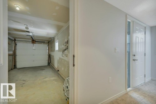 #142 104 West Haven Dr, Leduc, AB - Indoor Photo Showing Garage