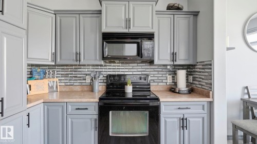 #18 4900 62 St, Beaumont, AB - Indoor Photo Showing Kitchen