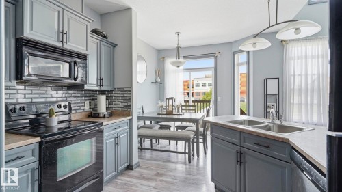 #18 4900 62 St, Beaumont, AB - Indoor Photo Showing Kitchen With Double Sink With Upgraded Kitchen
