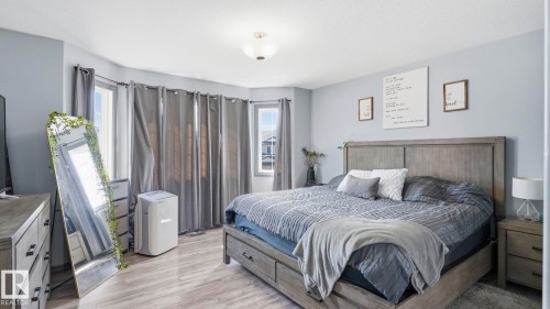 #18 4900 62 St, Beaumont, AB - Indoor Photo Showing Bedroom
