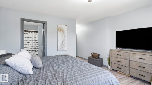 #18 4900 62 St, Beaumont, AB - Indoor Photo Showing Bedroom