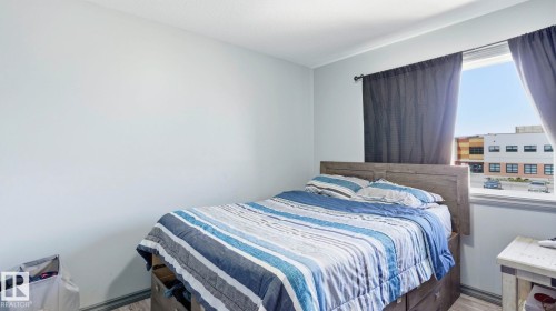 #18 4900 62 St, Beaumont, AB - Indoor Photo Showing Bedroom