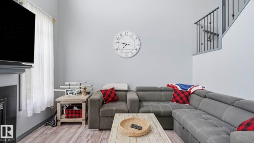 #18 4900 62 St, Beaumont, AB - Indoor Photo Showing Living Room