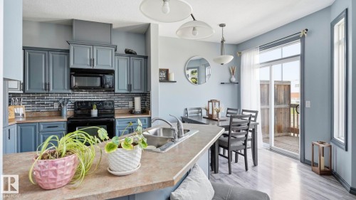 #18 4900 62 St, Beaumont, AB - Indoor Photo Showing Kitchen With Upgraded Kitchen
