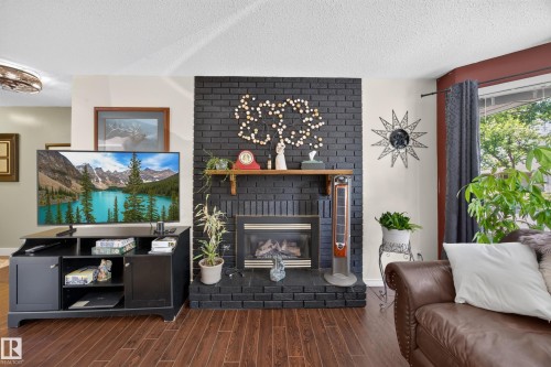 Living room - 8310 99 Avenue, Fort Saskatchewan, AB - Indoor With Fireplace