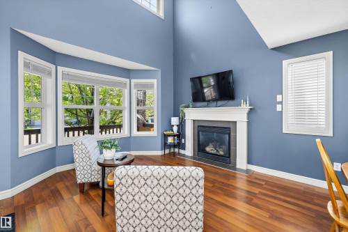 44 Vaughn Avenue, Spruce Grove, AB - Indoor Photo Showing Living Room With Fireplace