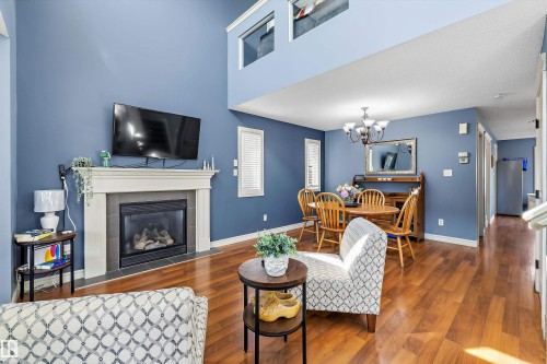 44 Vaughn Avenue, Spruce Grove, AB - Indoor Photo Showing Living Room With Fireplace