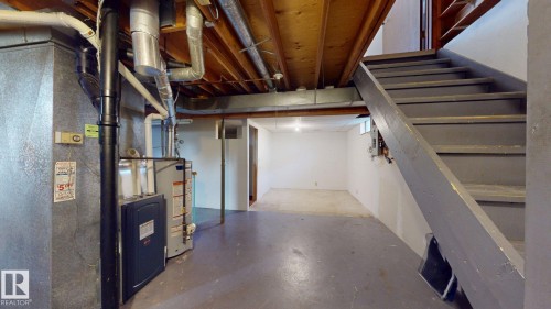 Unfinished basement offering ample storage potential - 4912 34A Avenue, Edmonton, AB - Indoor Photo Showing Basement