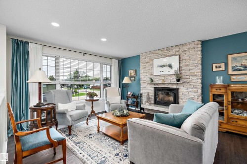 3915 42B Avenue, Leduc, AB - Indoor Photo Showing Living Room With Fireplace