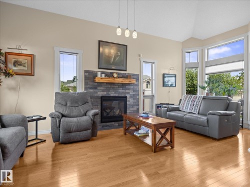 16948 116 Street Nw, Edmonton, AB - Indoor Photo Showing Living Room With Fireplace