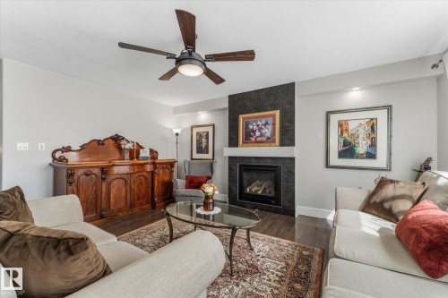 18 Rockwell Close, Fort Saskatchewan, AB - Indoor Photo Showing Living Room With Fireplace