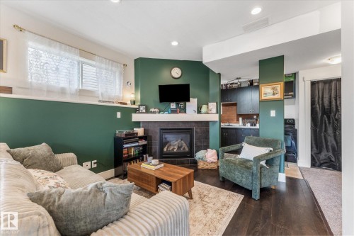 18 Rockwell Close, Fort Saskatchewan, AB - Indoor Photo Showing Living Room With Fireplace
