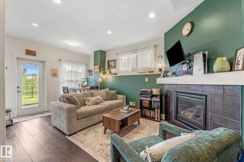 18 Rockwell Close, Fort Saskatchewan, AB - Indoor Photo Showing Living Room With Fireplace