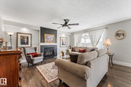 18 Rockwell Close, Fort Saskatchewan, AB - Indoor Photo Showing Living Room With Fireplace
