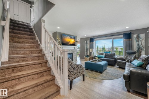 96 Marcelle Point(E), Beaumont, AB - Indoor Photo Showing Living Room With Fireplace