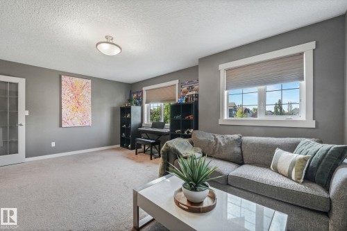 96 Marcelle Point(E), Beaumont, AB - Indoor Photo Showing Living Room