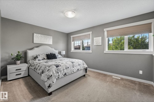 96 Marcelle Point(E), Beaumont, AB - Indoor Photo Showing Bedroom