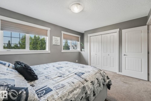 96 Marcelle Point(E), Beaumont, AB - Indoor Photo Showing Bedroom