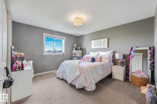 96 Marcelle Point(E), Beaumont, AB - Indoor Photo Showing Bedroom