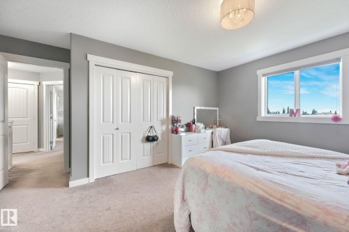 96 Marcelle Point(E), Beaumont, AB - Indoor Photo Showing Bedroom